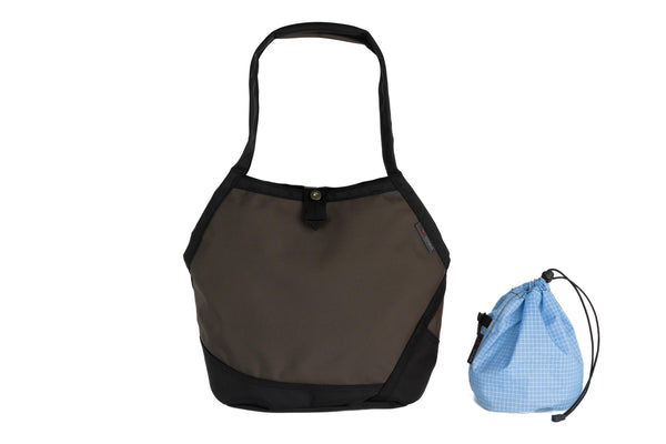 A Swift in Ursa Ballistic with Tidal (light blue with white grid) 200 Halcyon interior and Yarn Stuff Sack.